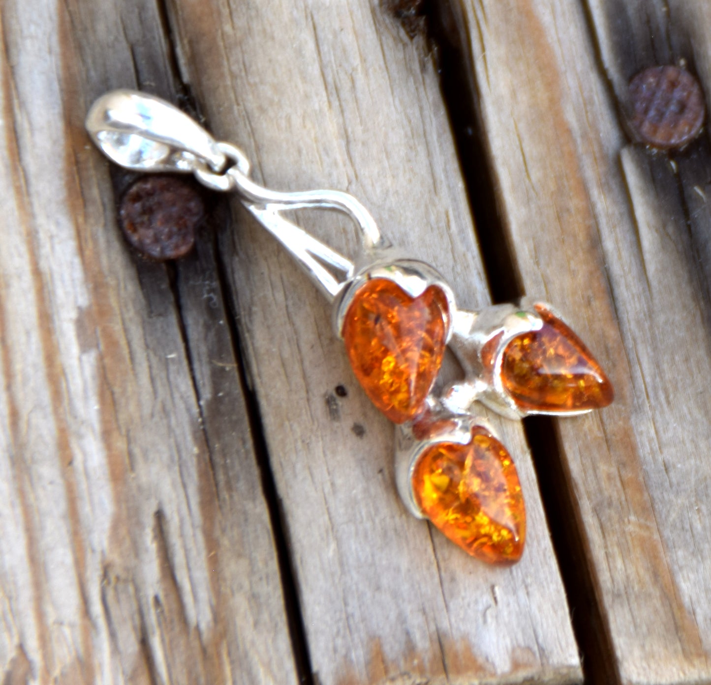 Bright pendant with a branch and natural cognac amber leaves in 925 Silver, MJ Baltica, BW308