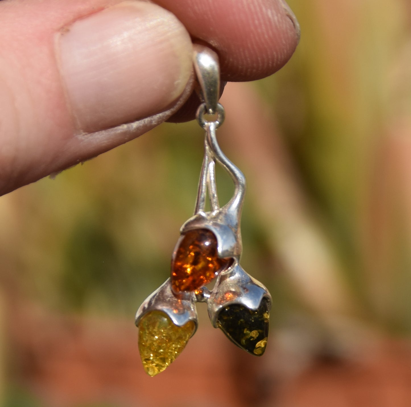 Luminous pendant with branch and natural Amber leaves in various shades, set in 925 Sterling Silver, MJ Baltica, BW309