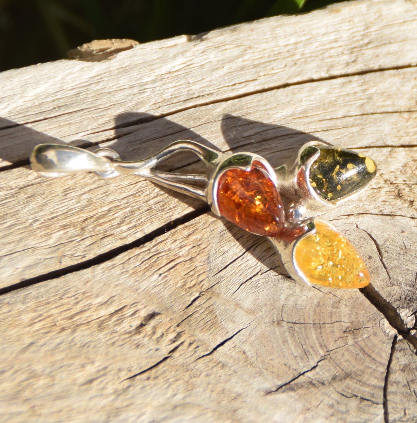 Luminous pendant with branch and natural Amber leaves in various shades, set in 925 Sterling Silver, MJ Baltica, BW309
