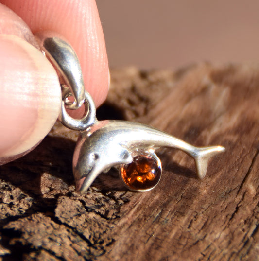 Delicate pendant with a joyful dolphin in cognac-colored natural Amber and 925 Silver, MJ Baltica, BW315
