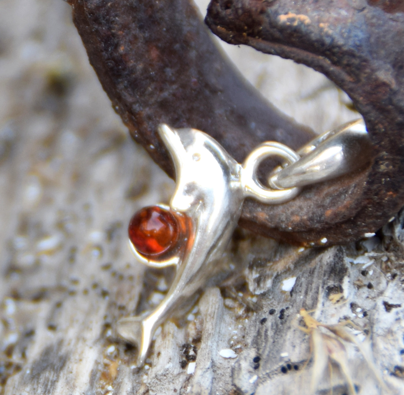 Delicate pendant with a joyful dolphin in cognac-colored natural Amber and 925 Silver, MJ Baltica, BW315