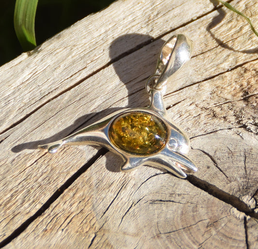 Delicate pendant with a joyful dolphin in natural green amber and 925 silver, MJ Baltica, BW320