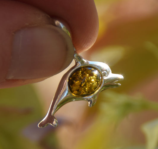 Delicate pendant with a joyful dolphin in natural green amber and 925 silver, MJ Baltica, BW320