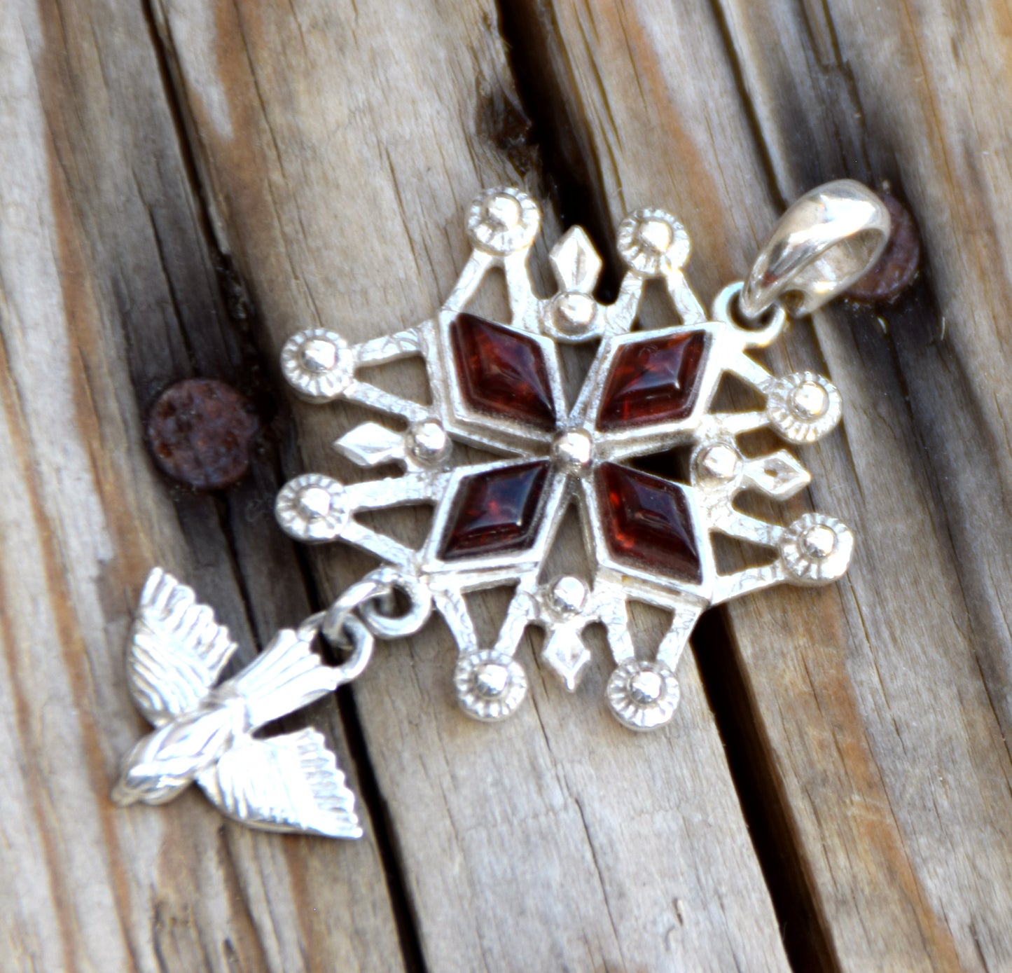 Cross-shaped pendant with a dove in natural brown amber and 925 Sterling Silver, MJ Baltica, BW326