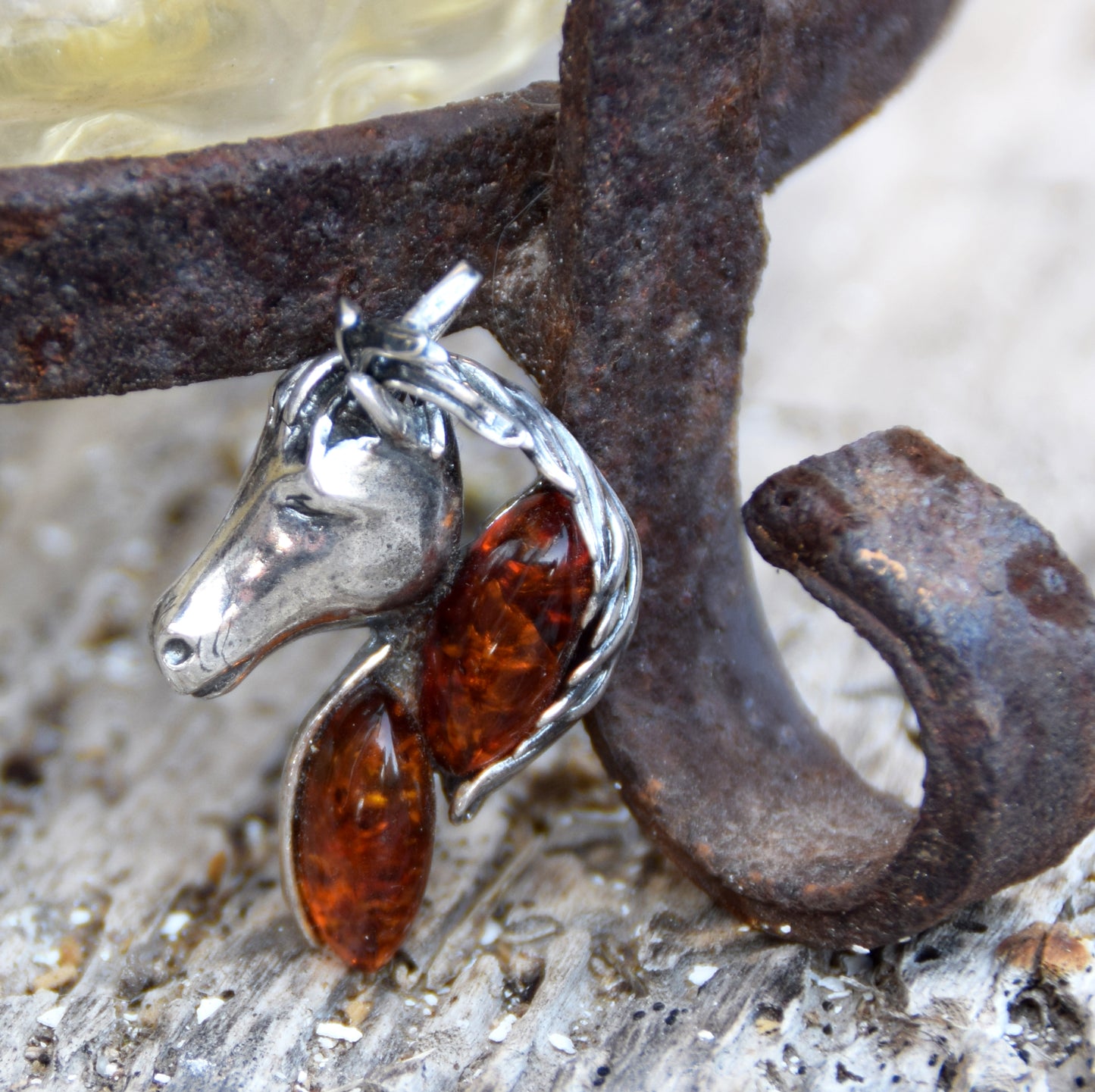 Cognac-colored natural amber and 925 sterling silver horse-shaped pendant, MJ Baltica, BW327