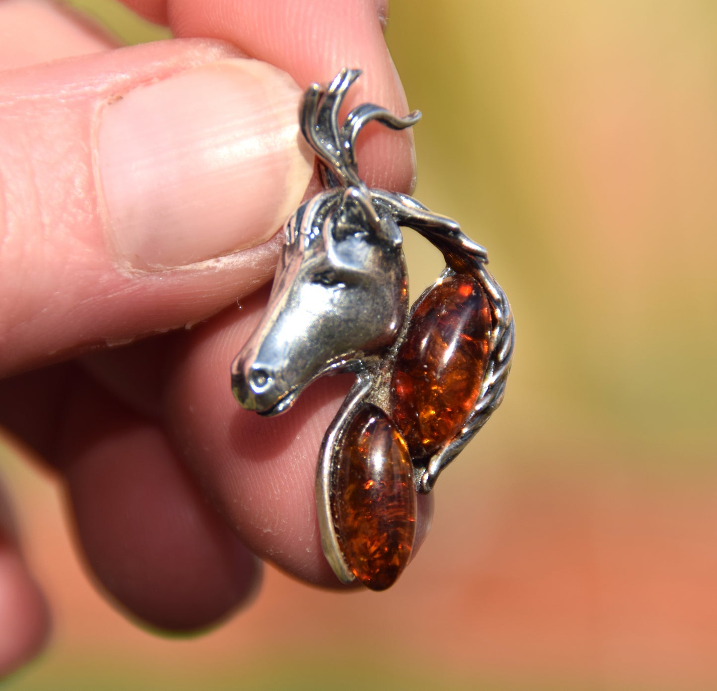 Cognac-colored natural amber and 925 sterling silver horse-shaped pendant, MJ Baltica, BW327