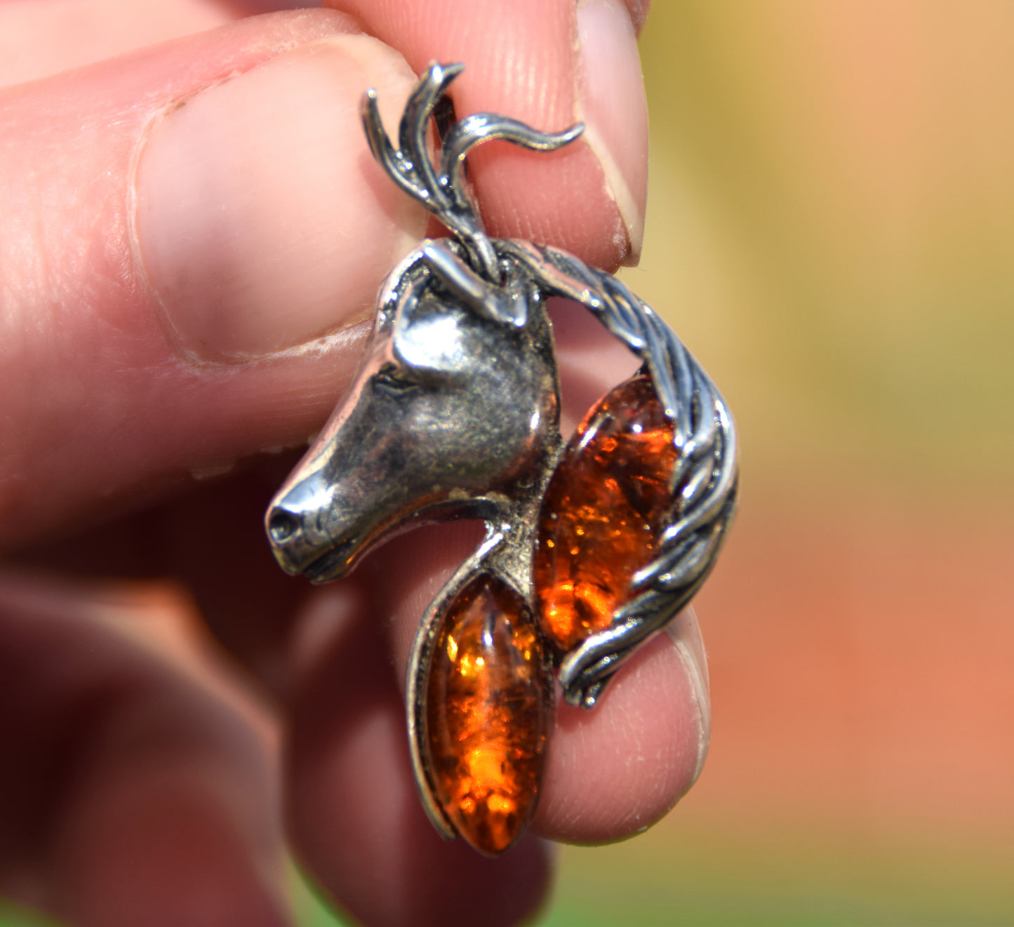 Cognac-colored natural amber and 925 sterling silver horse-shaped pendant, MJ Baltica, BW327