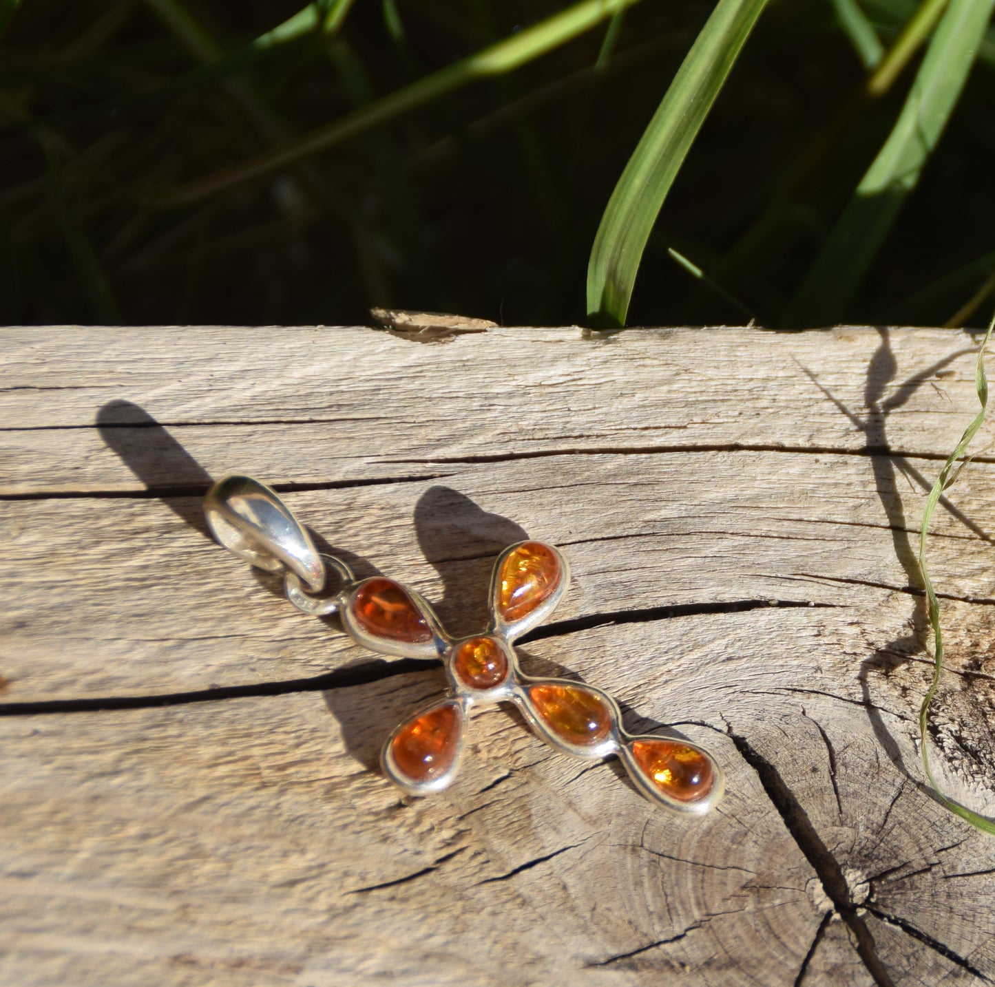 Delicate cross-shaped pendant in natural cognac Amber and 925 Silver, MJ Baltica, BW329