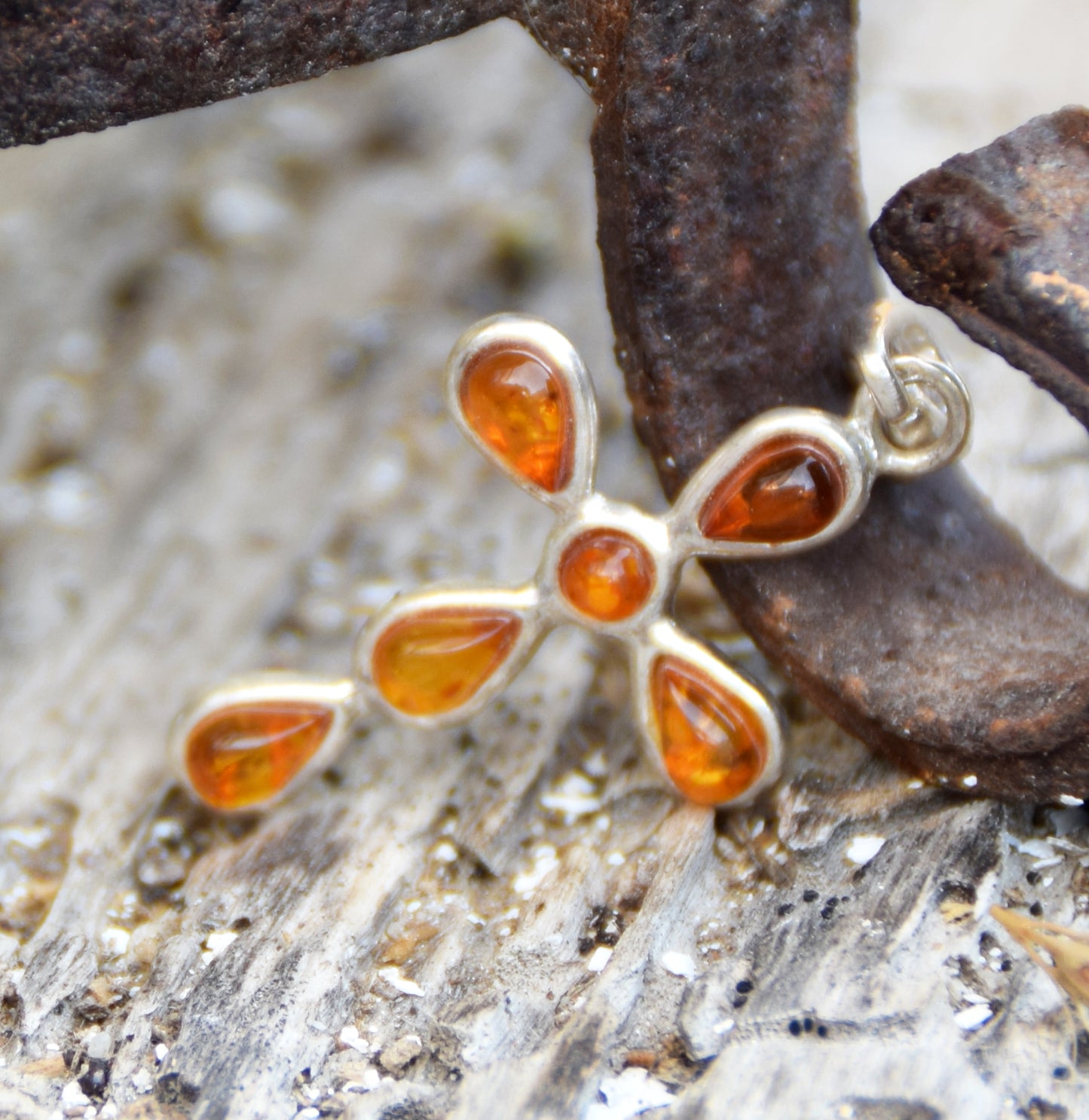 Delicate cross-shaped pendant in natural cognac Amber and 925 Silver, MJ Baltica, BW329