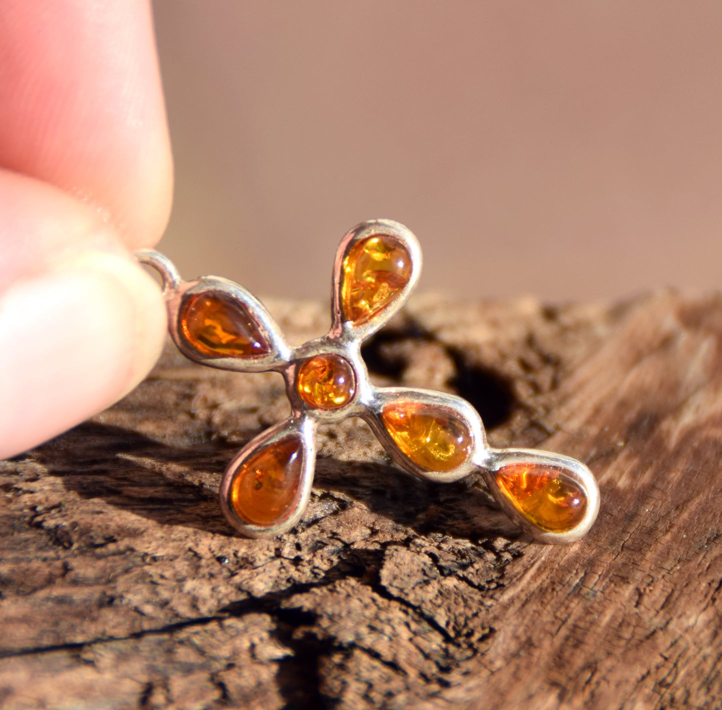 Delicate cross-shaped pendant in natural cognac Amber and 925 Silver, MJ Baltica, BW329