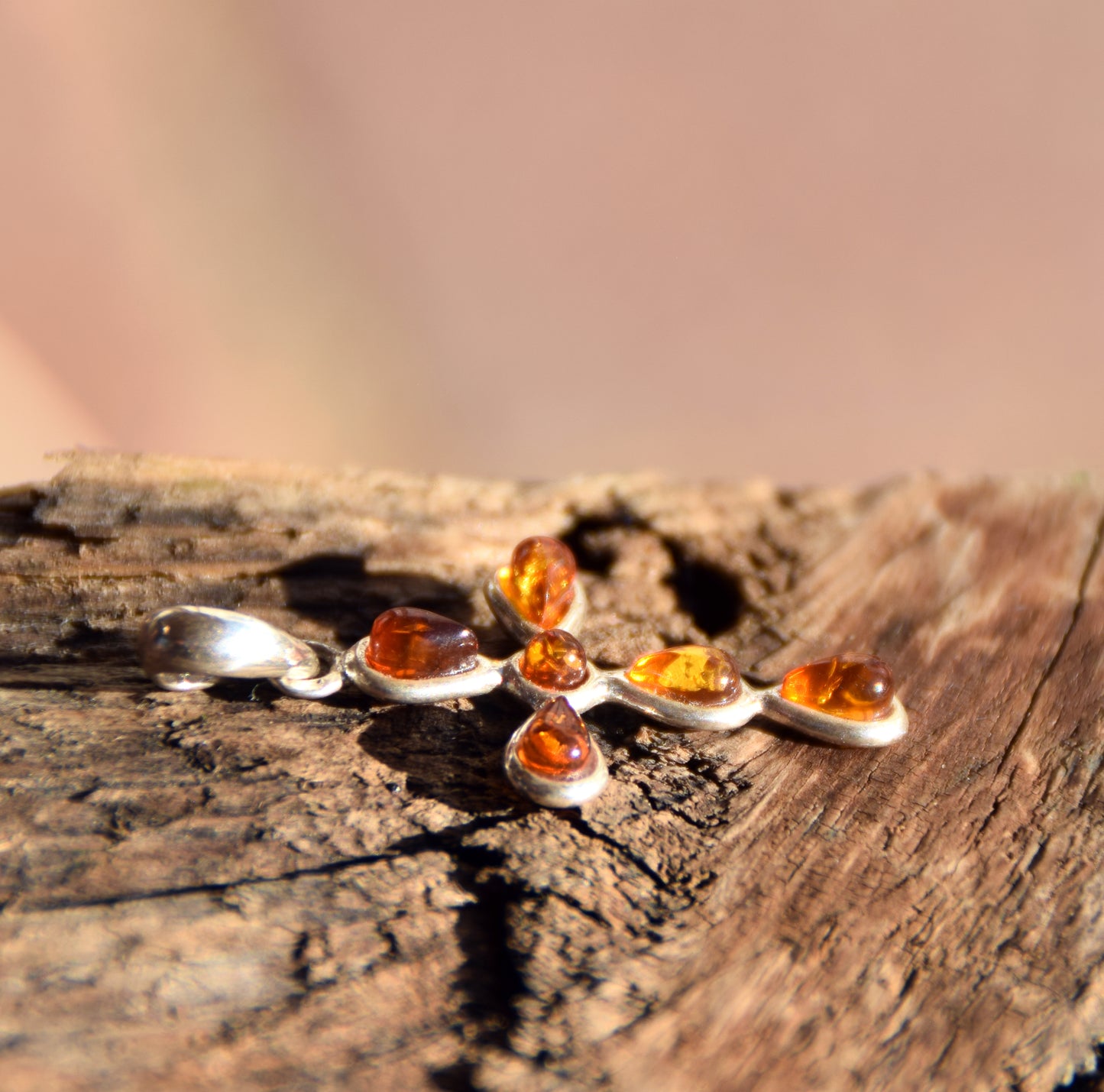 Delicate cross-shaped pendant in natural cognac Amber and 925 Silver, MJ Baltica, BW329