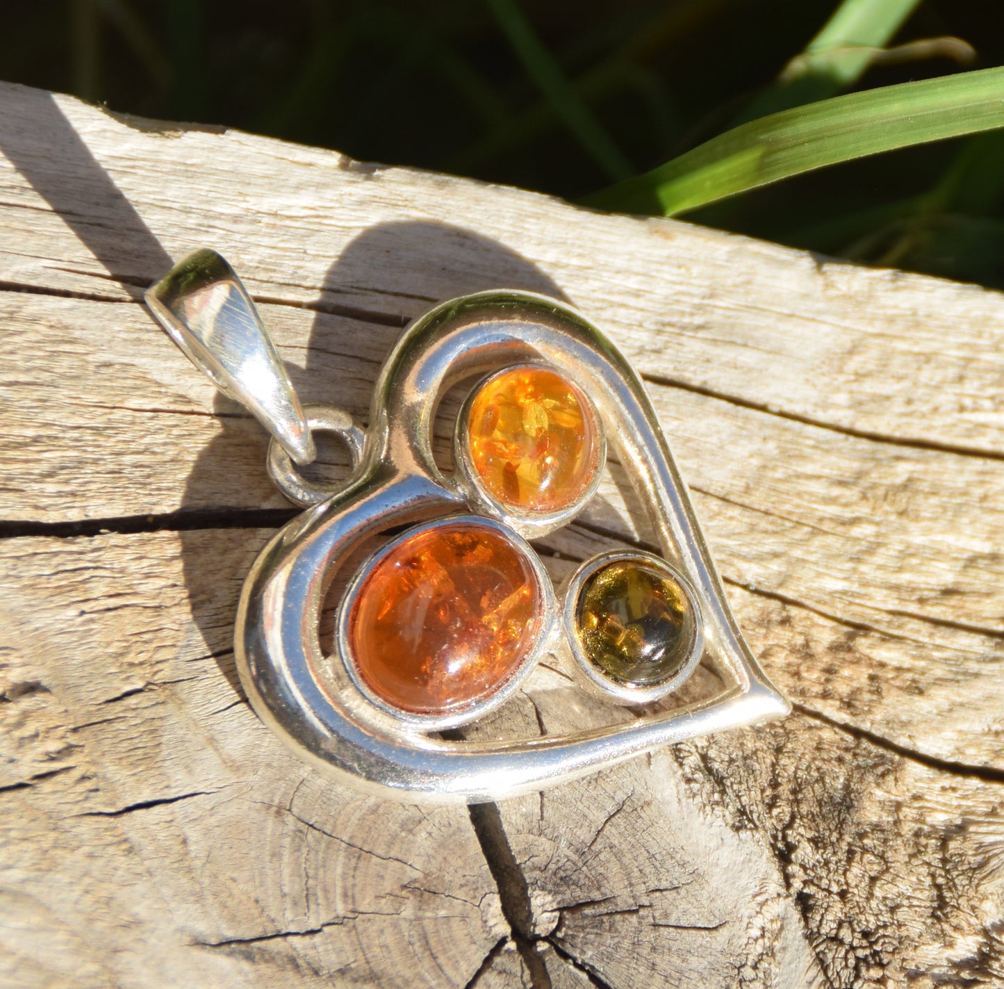 Romantic heart-shaped pendant with natural Amber of various shades and 925 Sterling Silver, MJ Baltica, BW330