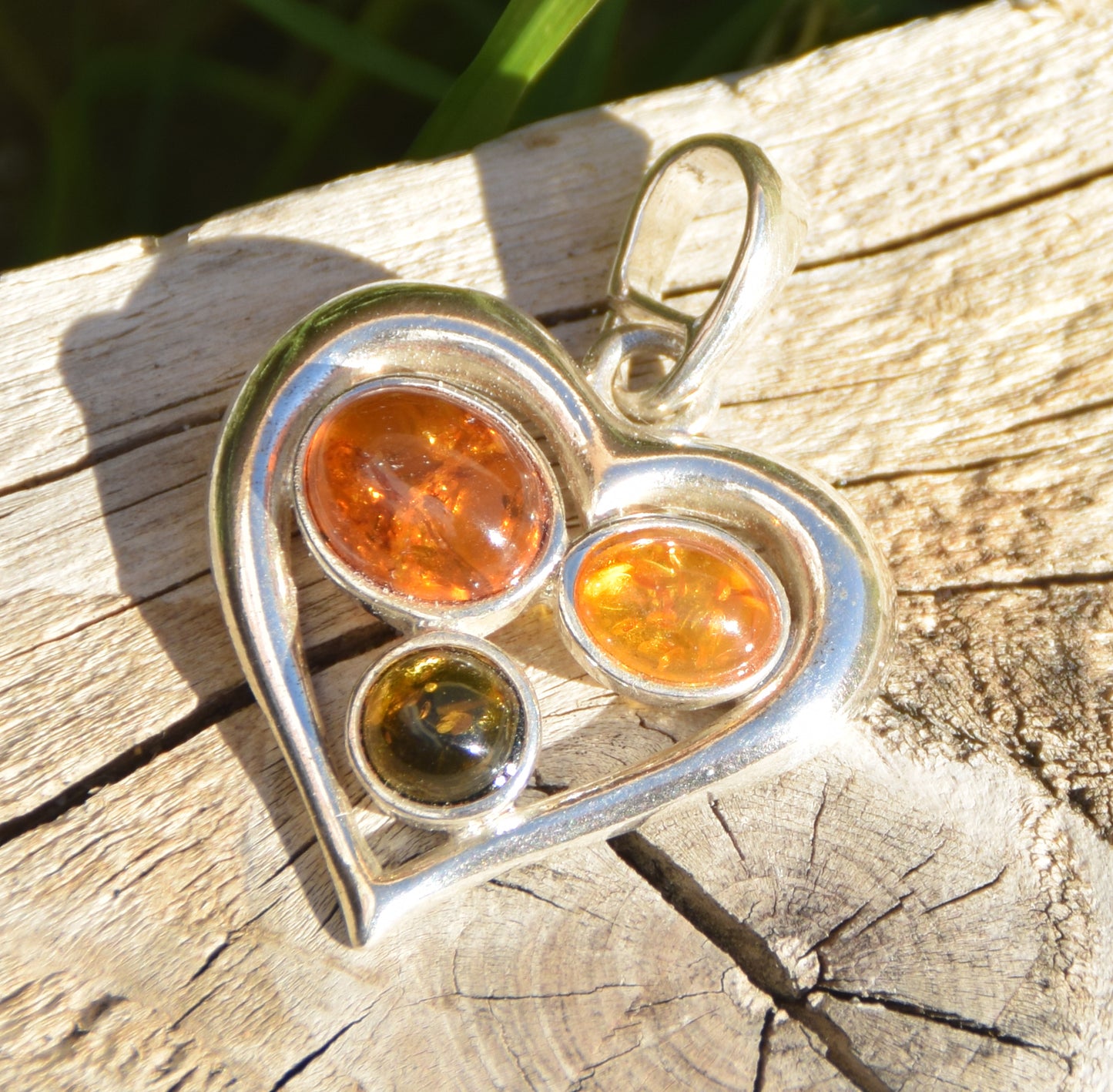 Romantic heart-shaped pendant with natural Amber of various shades and 925 Sterling Silver, MJ Baltica, BW330