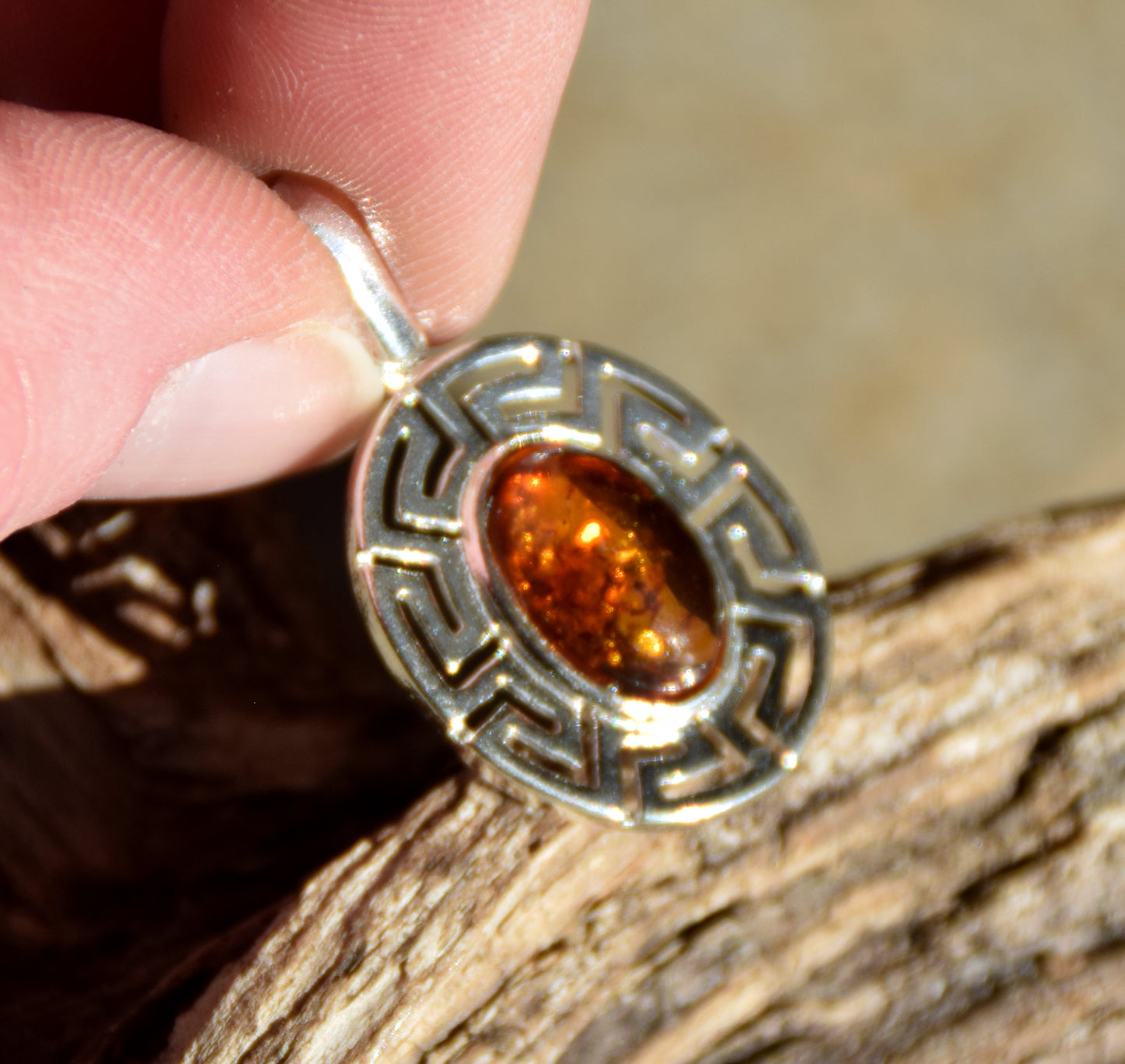 Delicate pendant crafted from natural cognac-colored Amber and 925 Silver, MJ Baltica, BW334