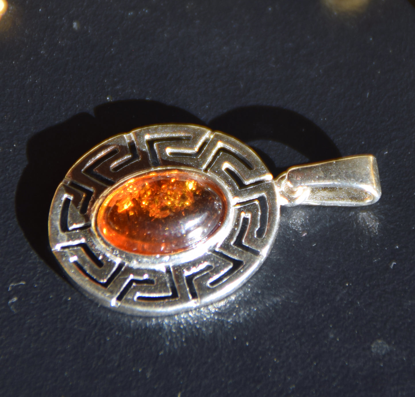 Delicate pendant crafted from natural cognac-colored Amber and 925 Silver, MJ Baltica, BW334