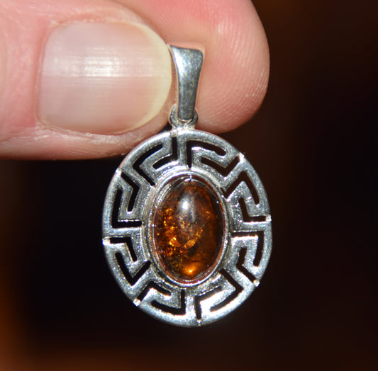 Delicate pendant crafted from natural cognac-colored Amber and 925 Silver, MJ Baltica, BW334