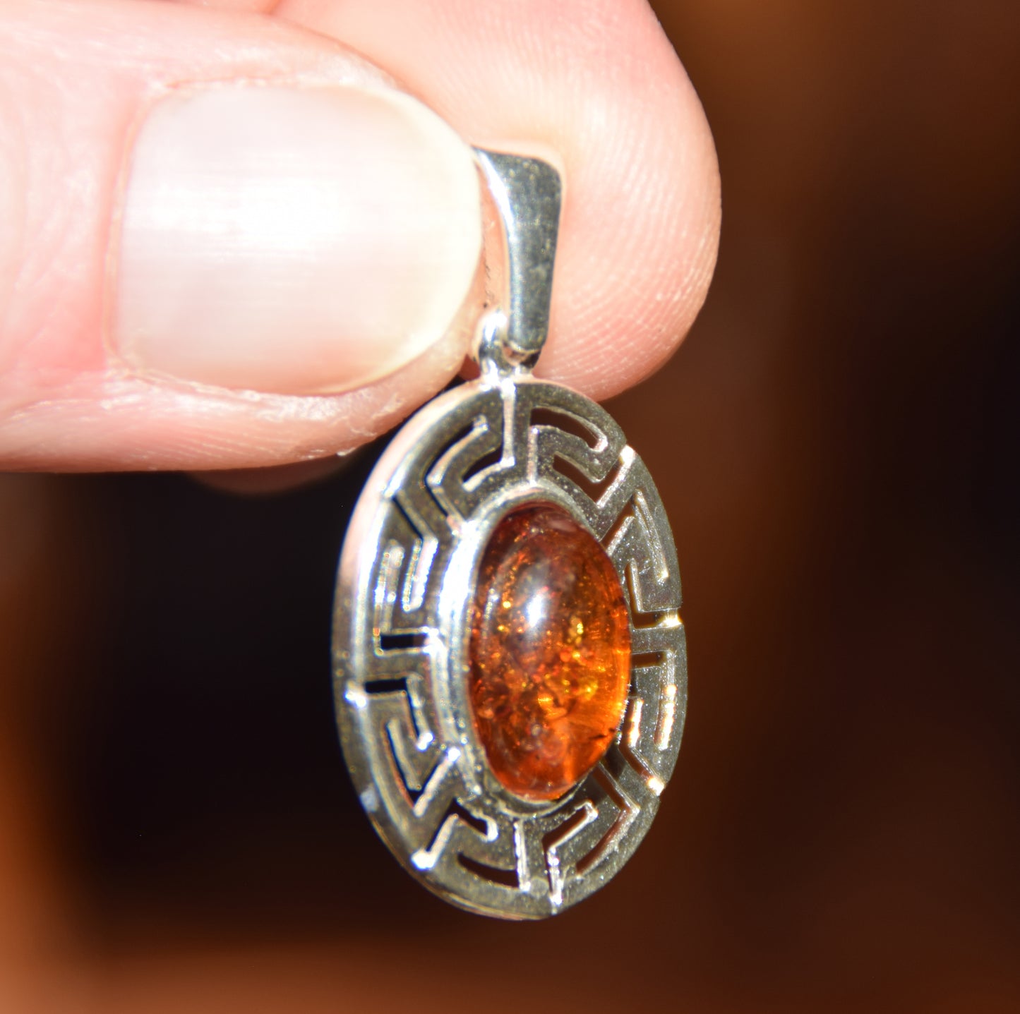 Delicate pendant crafted from natural cognac-colored Amber and 925 Silver, MJ Baltica, BW334