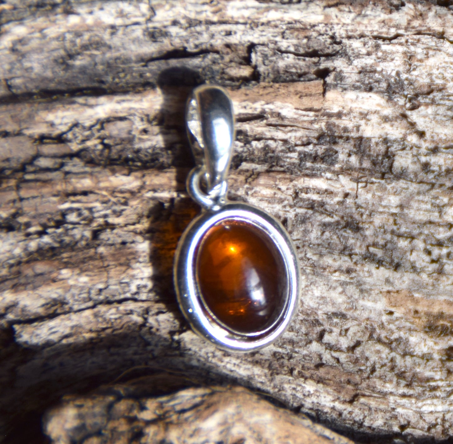 Delicate pendant created with natural cognac-colored Amber and Sterling Silver 925, MJ Baltica, BW335