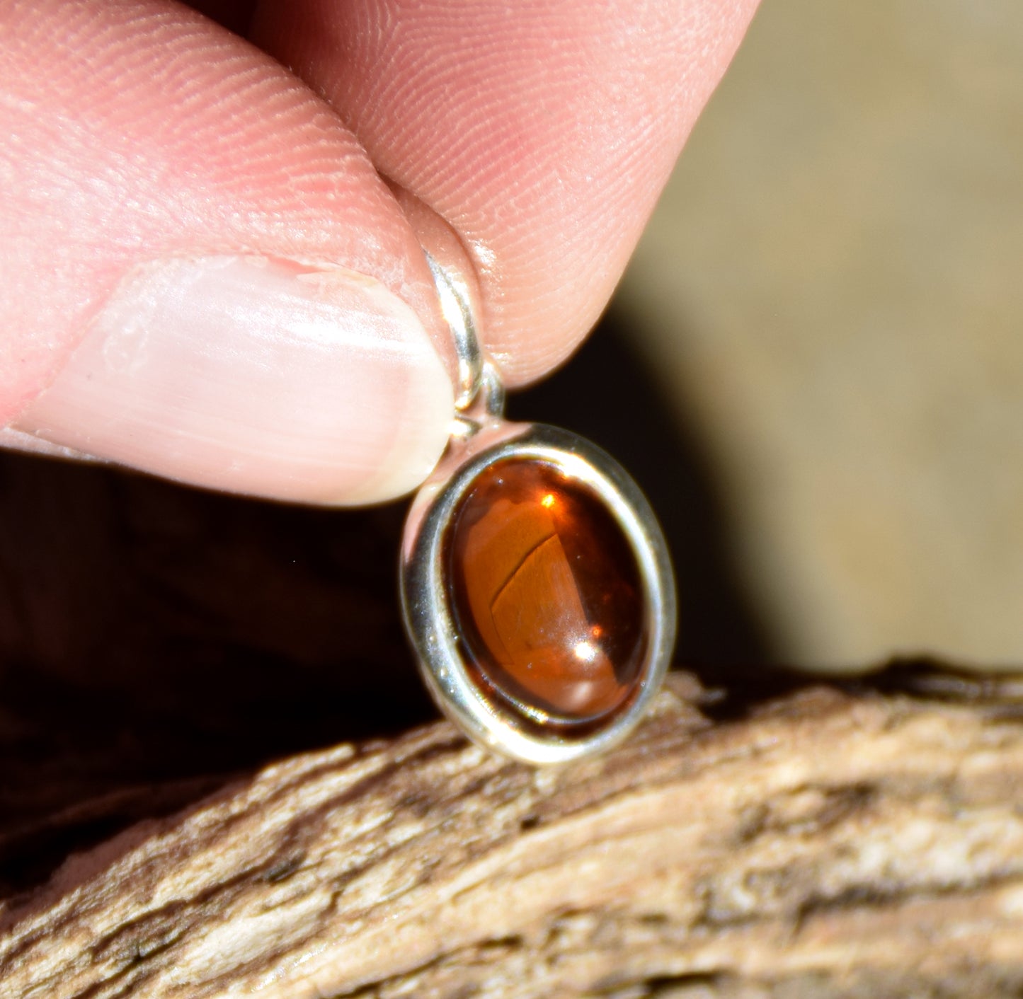 Delicate pendant created with natural cognac-colored Amber and Sterling Silver 925, MJ Baltica, BW335