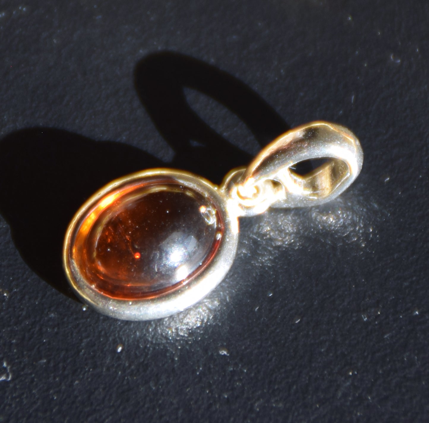 Delicate pendant created with natural cognac-colored Amber and Sterling Silver 925, MJ Baltica, BW335