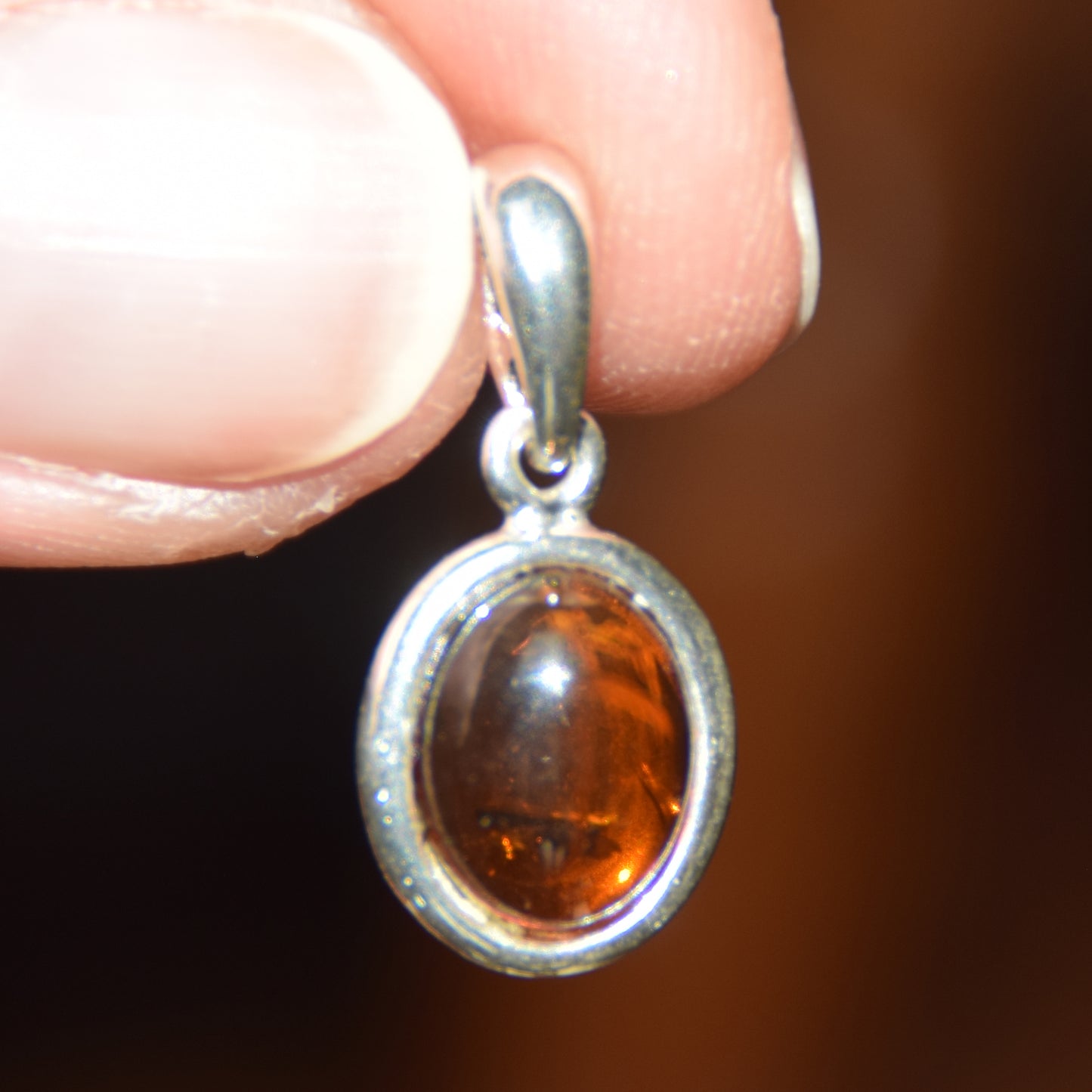 Delicate pendant created with natural cognac-colored Amber and Sterling Silver 925, MJ Baltica, BW335