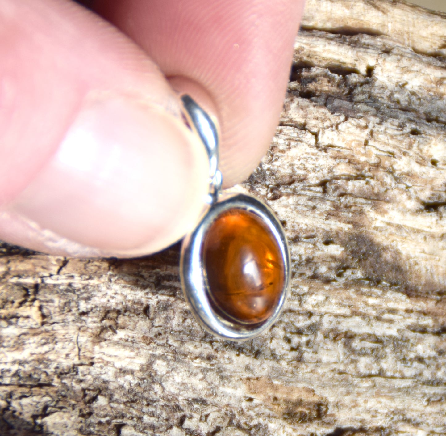 Delicate pendant created with natural cognac-colored Amber and Sterling Silver 925, MJ Baltica, BW335