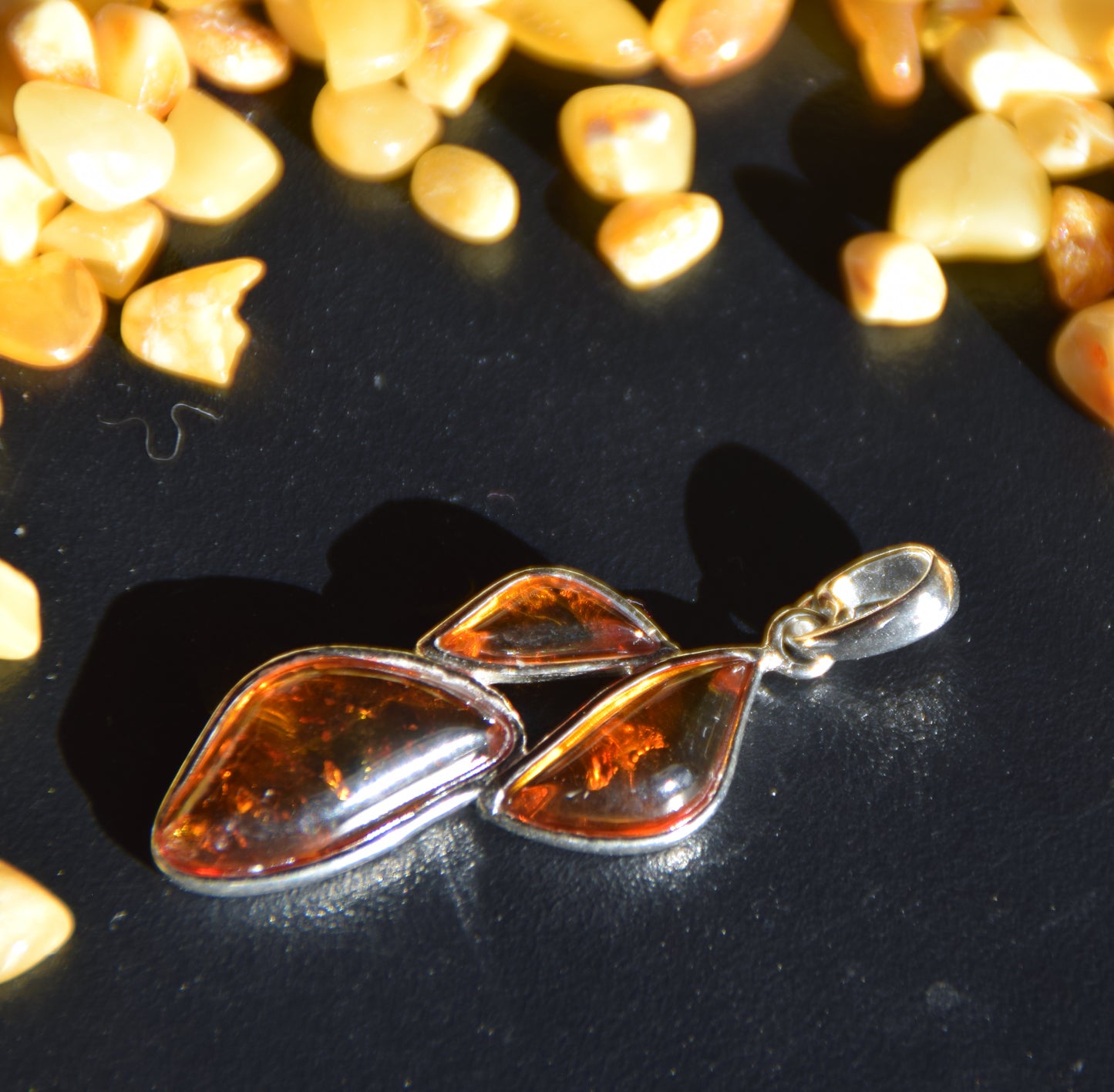 Luminous floral pendant with cognac-colored natural Amber in Sterling Silver 925, MJ Baltica, BW337