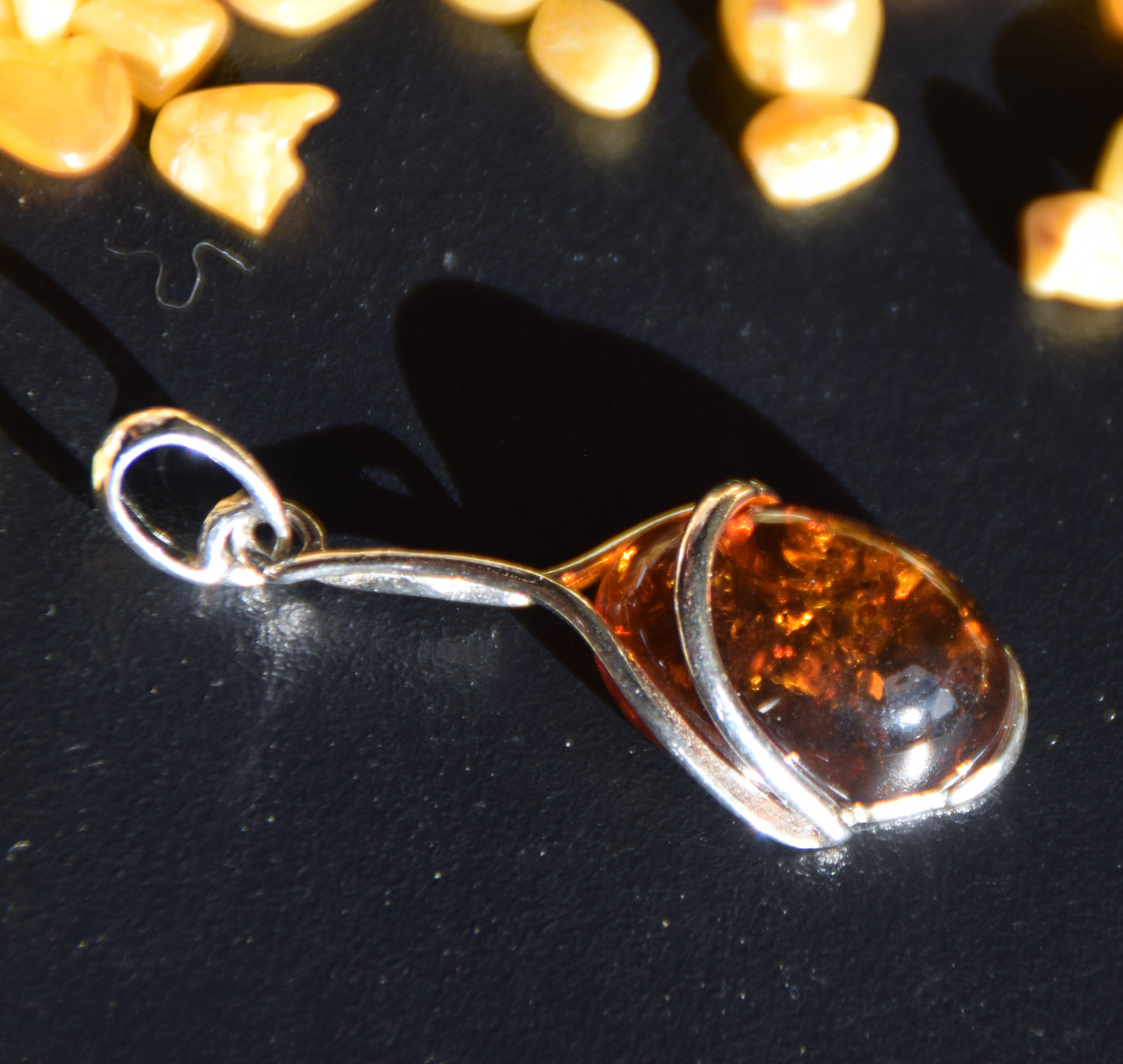 Elegant oval pendant in cognac-colored natural amber and 925 sterling silver, MJ Baltica, BW338
