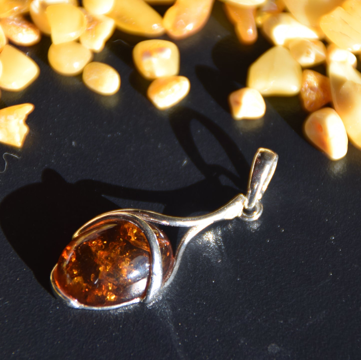 Elegant oval pendant in cognac-colored natural amber and 925 sterling silver, MJ Baltica, BW338