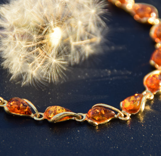 Luminous bracelet with cognac-colored natural Amber drops and 18k Gold-plated 925 Sterling Silver, MJ Baltica, BZB020