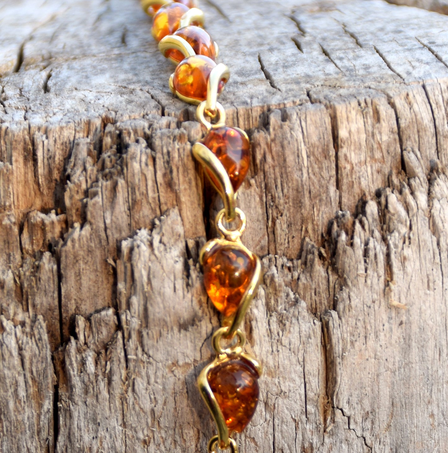 Luminous bracelet with cognac-colored natural Amber drops and 18k Gold-plated 925 Sterling Silver, MJ Baltica, BZB020