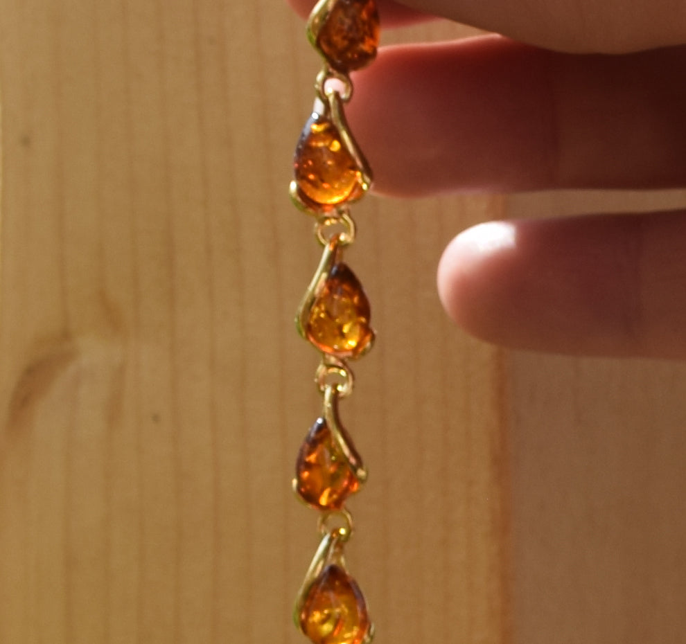 Luminous bracelet with cognac-colored natural Amber drops and 18k Gold-plated 925 Sterling Silver, MJ Baltica, BZB020