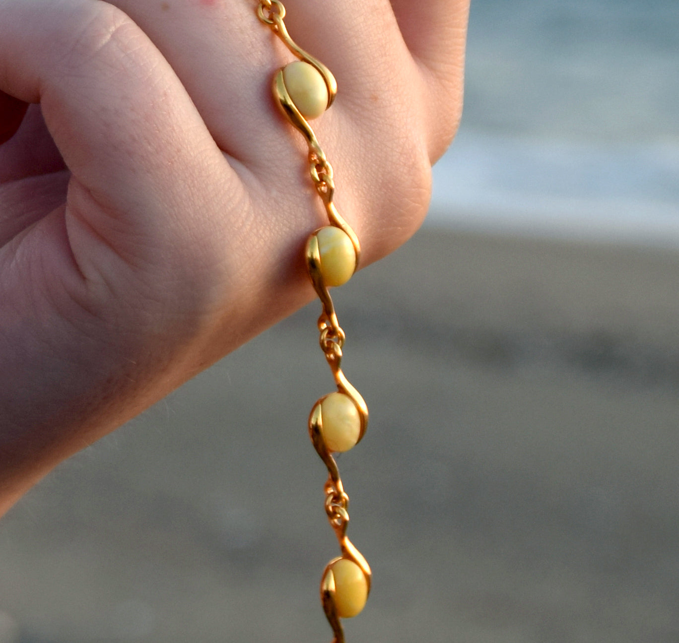 Linear bracelet with oval Imperial natural Amber gemstones and 18k gold-plated 925 silver, MJ Baltica, BZB040