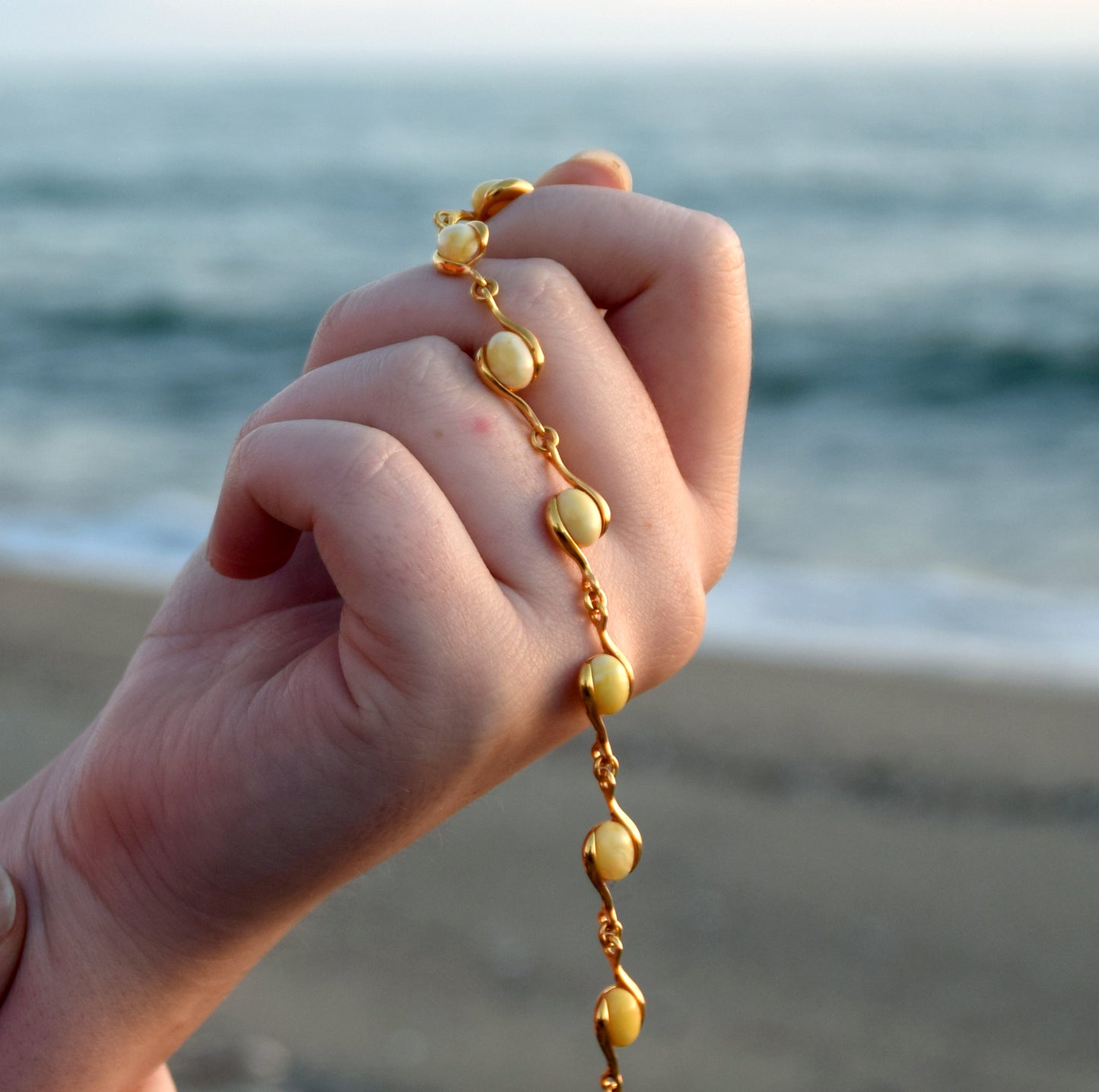 Linear bracelet with oval Imperial natural Amber gemstones and 18k gold-plated 925 silver, MJ Baltica, BZB040