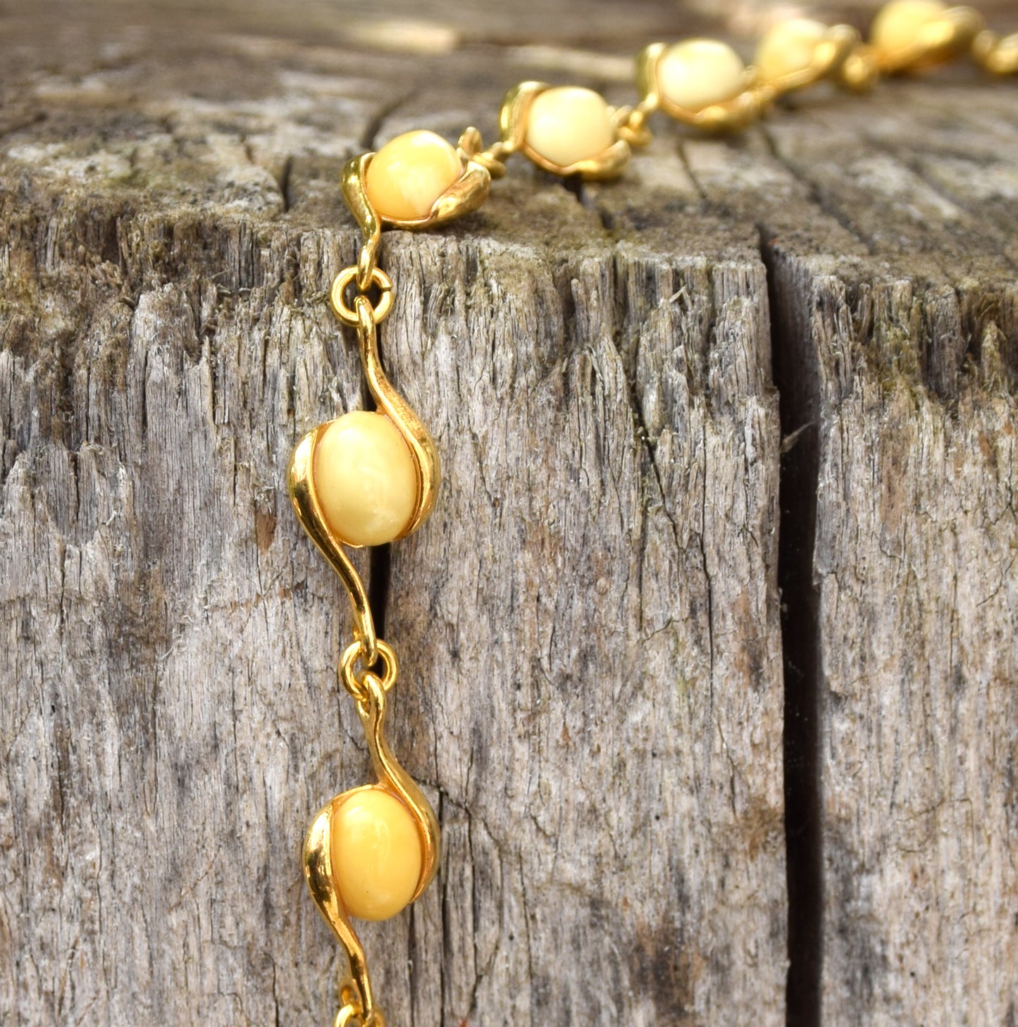 Linear bracelet with oval Imperial natural Amber gemstones and 18k gold-plated 925 silver, MJ Baltica, BZB040