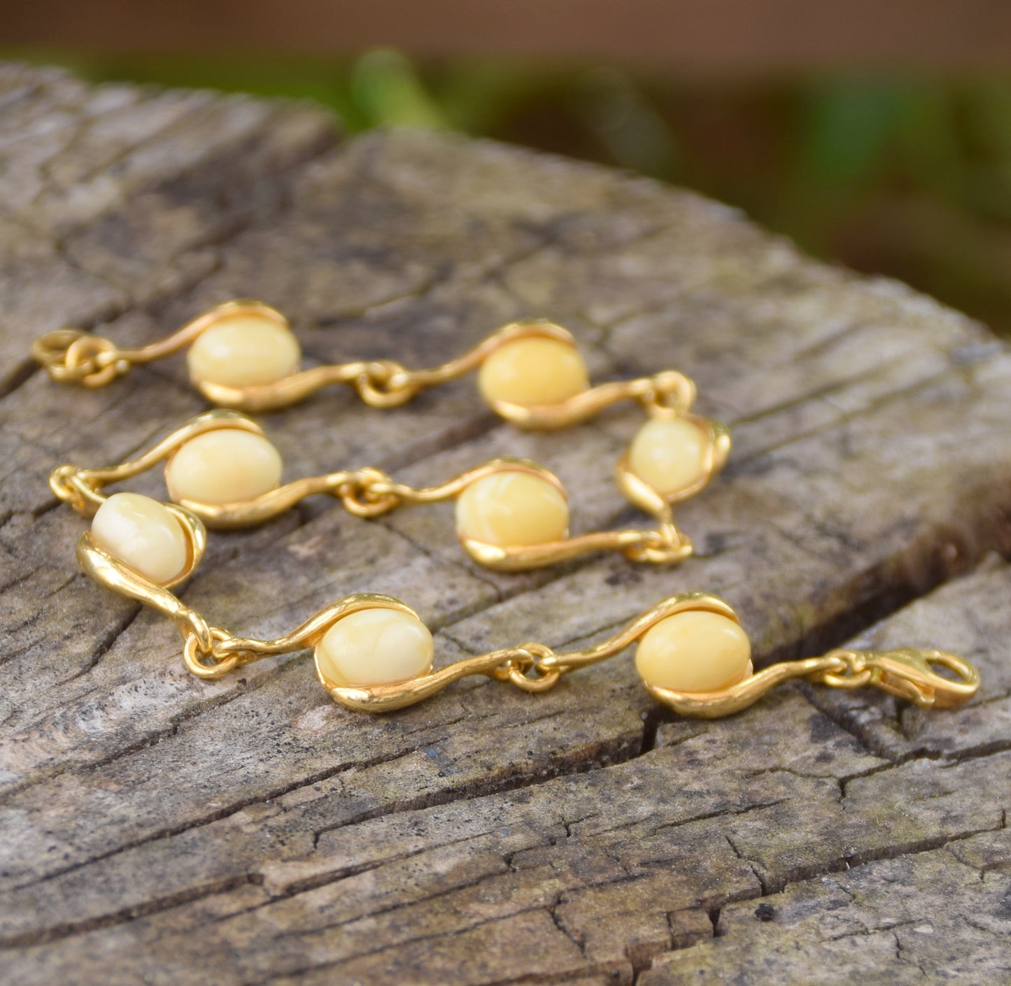 Linear bracelet with oval Imperial natural Amber gemstones and 18k gold-plated 925 silver, MJ Baltica, BZB040