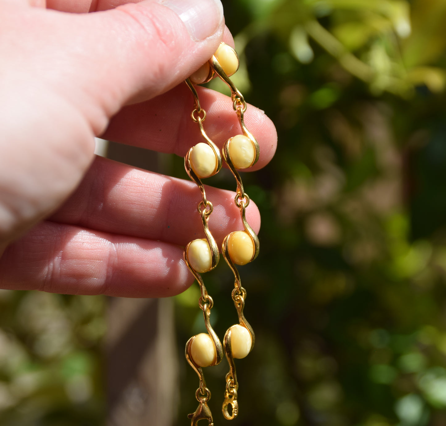 Linear bracelet with oval Imperial natural Amber gemstones and 18k gold-plated 925 silver, MJ Baltica, BZB040