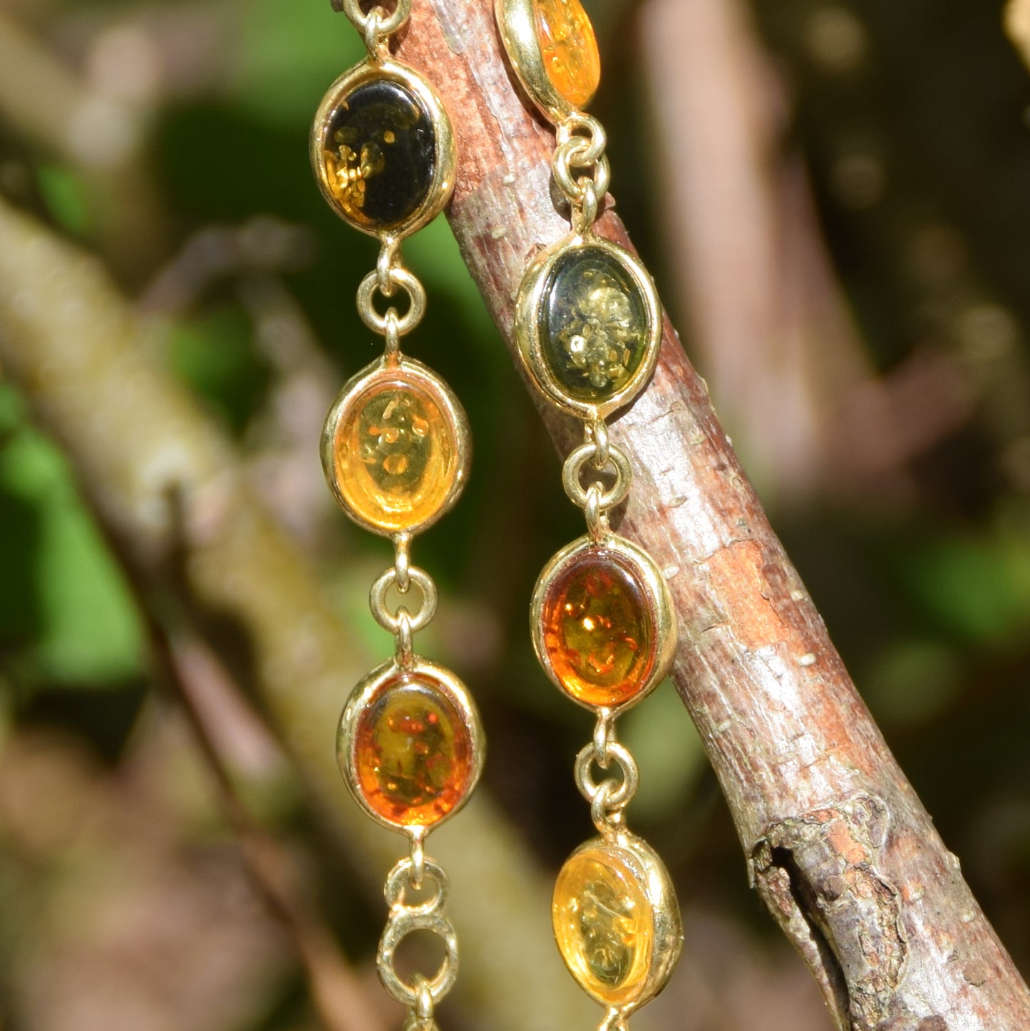 Elegant bracelet in natural amber of various shades and 18k gold-plated silver, MJ Baltica, BZB050