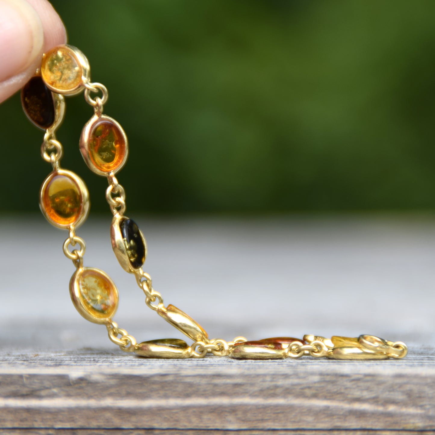 Elegant bracelet in natural amber of various shades and 18k gold-plated silver, MJ Baltica, BZB050