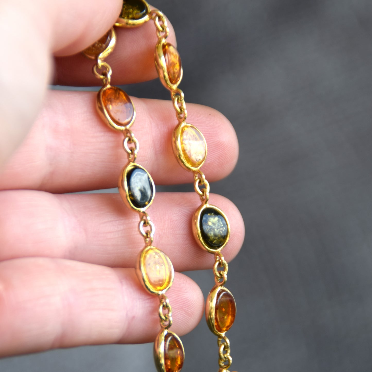 Elegant bracelet in natural amber of various shades and 18k gold-plated silver, MJ Baltica, BZB050