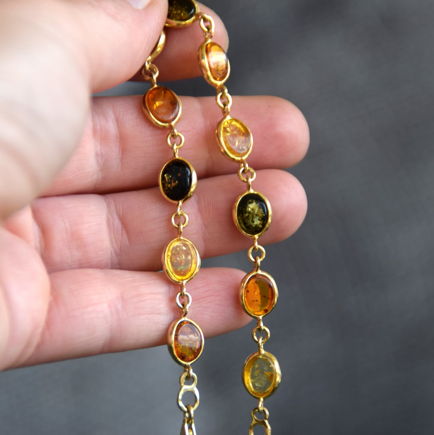 Elegant bracelet in natural amber of various shades and 18k gold-plated silver, MJ Baltica, BZB050