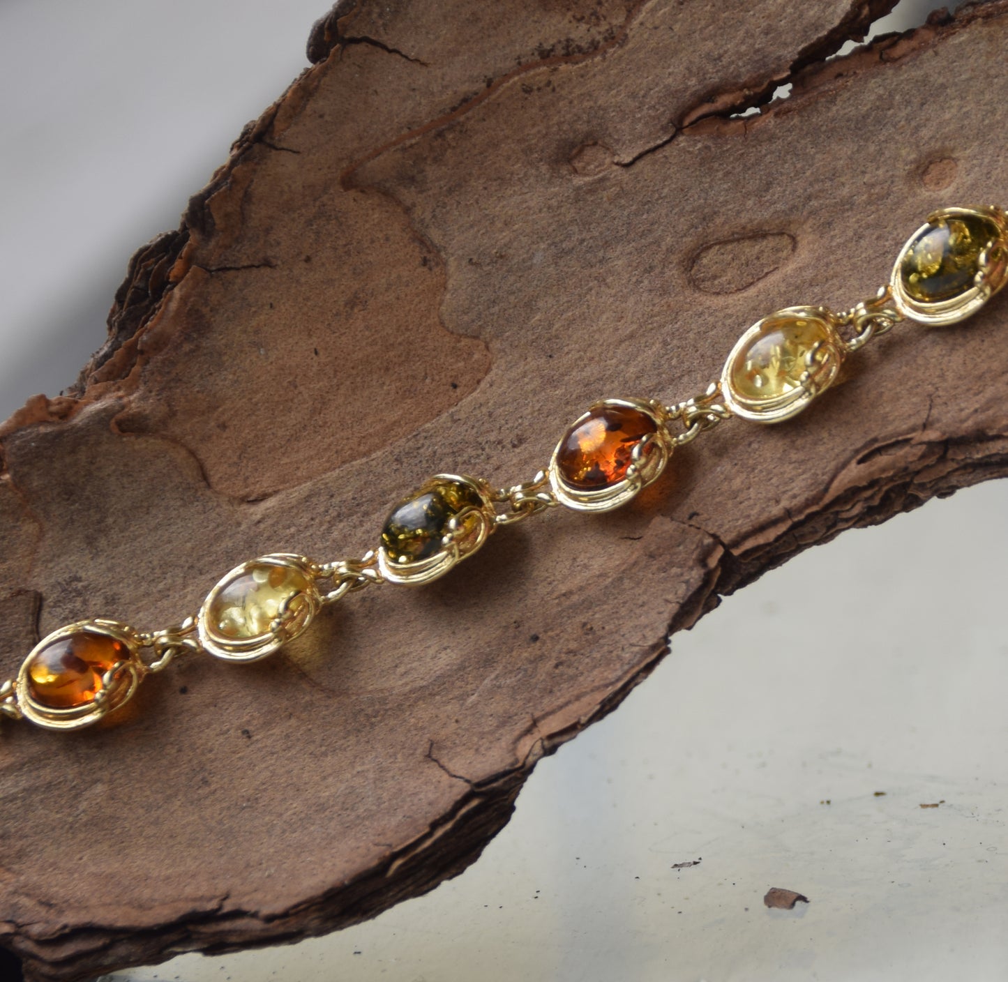 Elegant vintage-style bracelet with natural Amber of various shades and 18k Gold-plated 925 Sterling Silver, MJ Baltica, BZB059