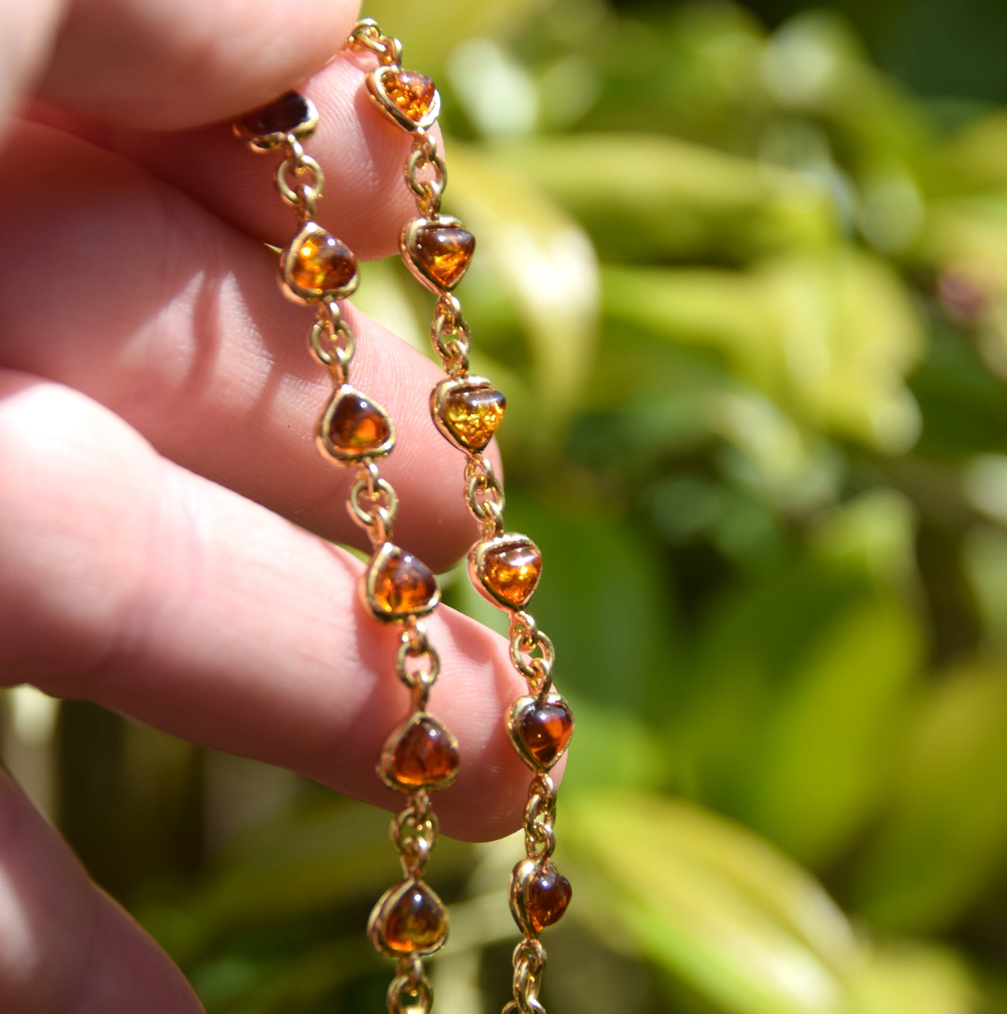 Romantic bracelet with heart chain crafted from natural cognac amber and 18k gold-plated 925 silver, MJ Baltica, BZB061