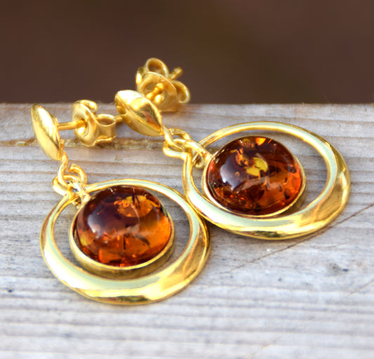 Large earrings with round cognac-colored natural Amber gemstone and 18k Gold plated 925 Sterling Silver, MJ Baltica, BZK063