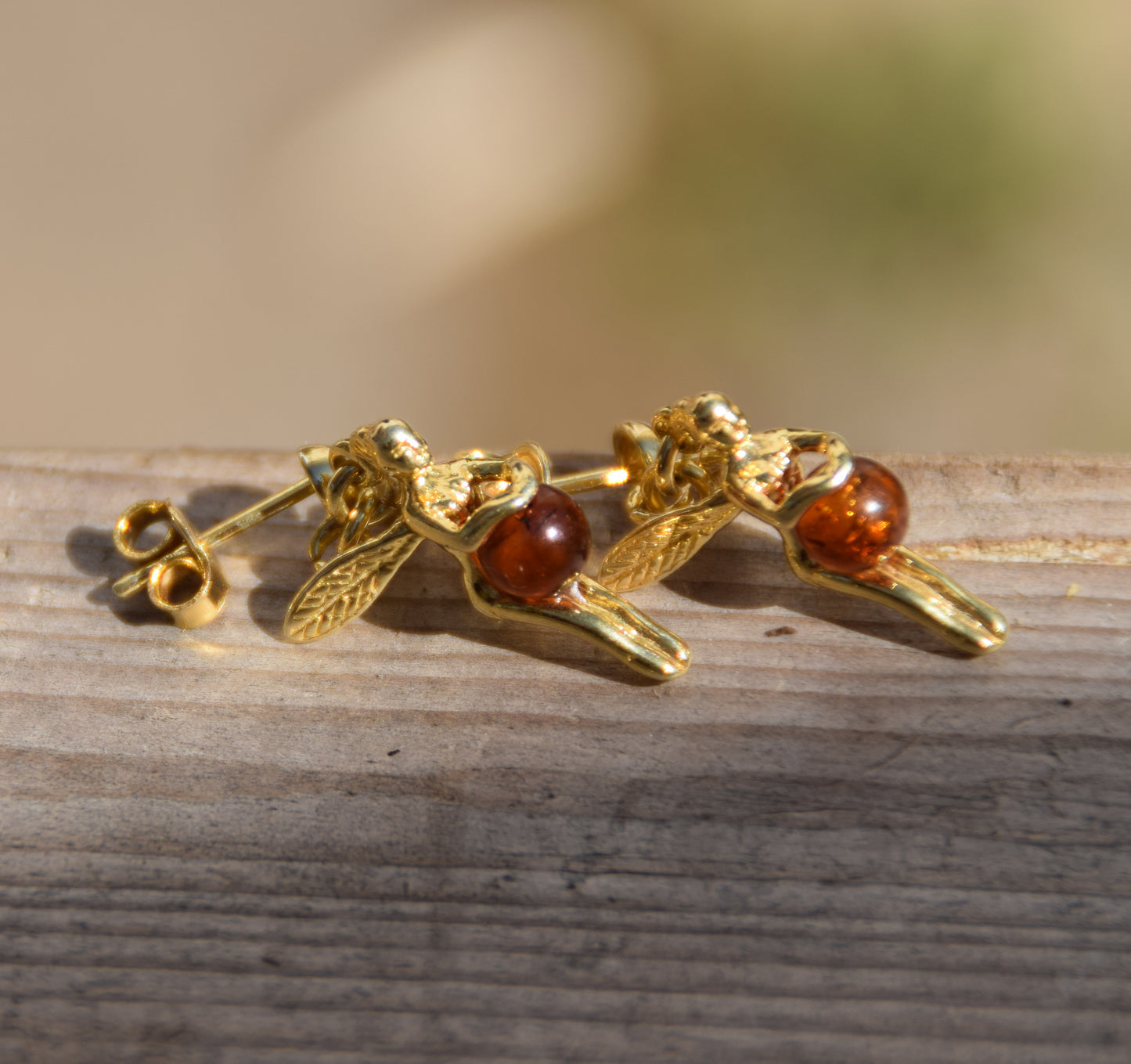 Bright earrings with fairies in natural cognac-colored amber and 18k gold-plated 925 sterling silver, MJ Baltica, BZK168