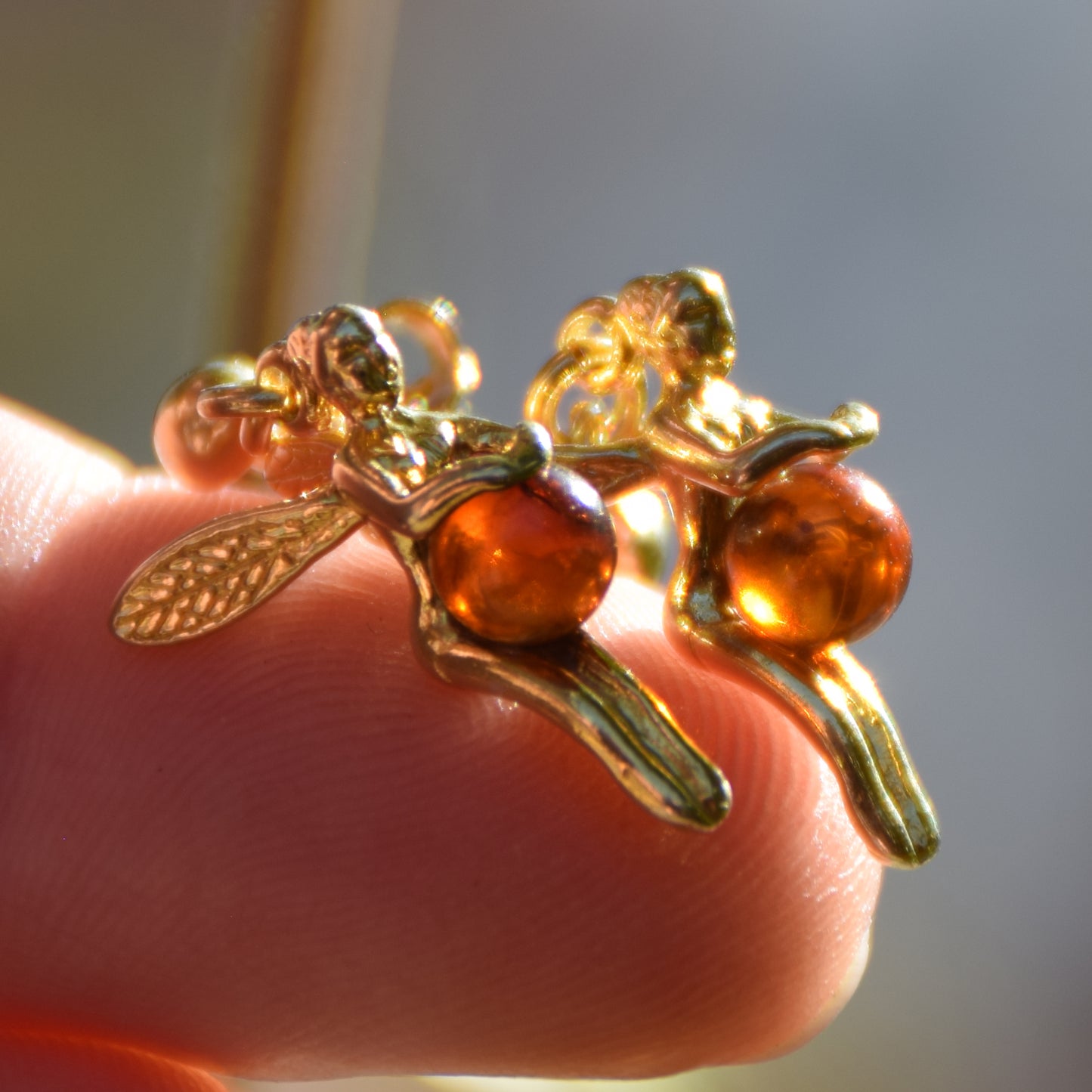 Bright earrings with fairies in natural cognac-colored amber and 18k gold-plated 925 sterling silver, MJ Baltica, BZK168