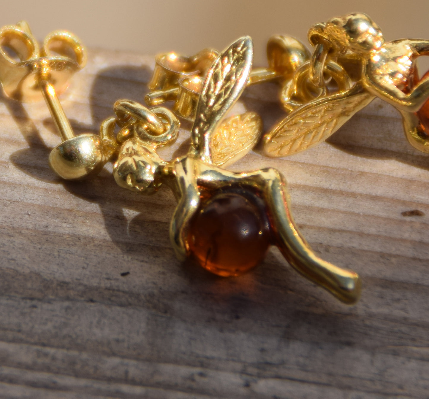 Bright earrings with fairies in natural cognac-colored amber and 18k gold-plated 925 sterling silver, MJ Baltica, BZK168