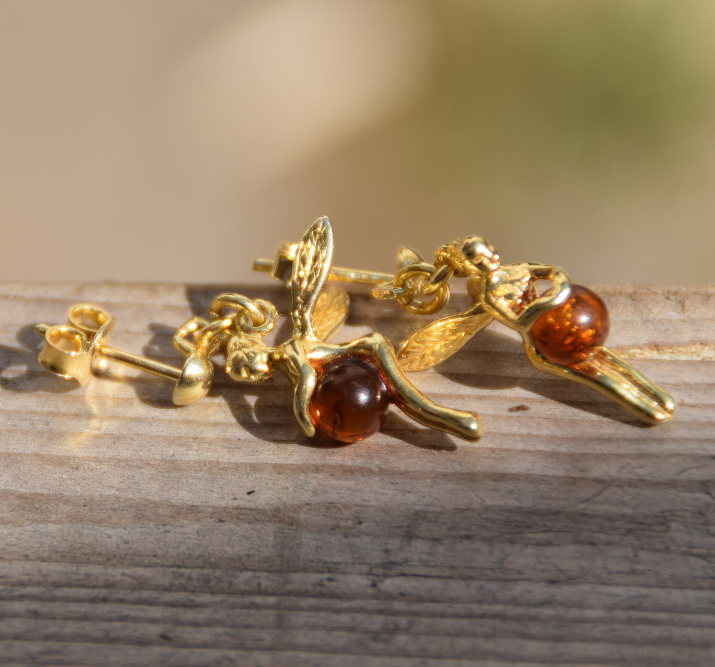 Bright earrings with fairies in natural cognac-colored amber and 18k gold-plated 925 sterling silver, MJ Baltica, BZK168