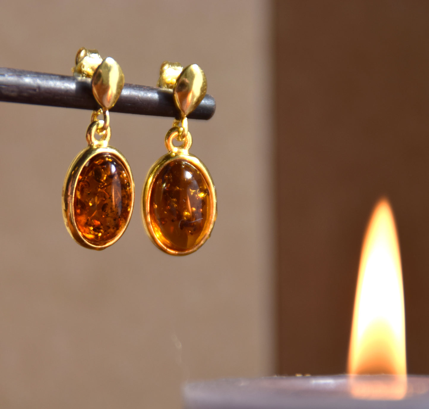 Elegant oval earrings in natural cognac Amber and 18k Gold plated 925 Sterling Silver, MJ Baltica, BZK171