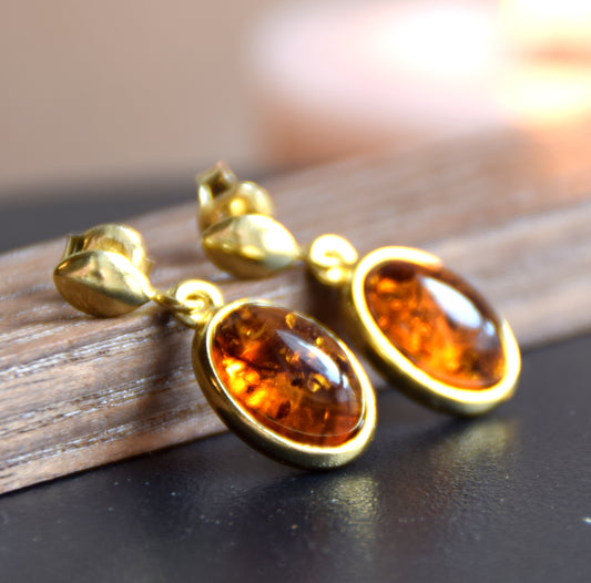 Elegant oval earrings in natural cognac Amber and 18k Gold plated 925 Sterling Silver, MJ Baltica, BZK171